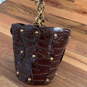 brown leather bucket bag